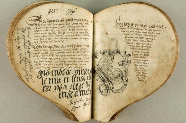 Heart-shaped book with handwriting