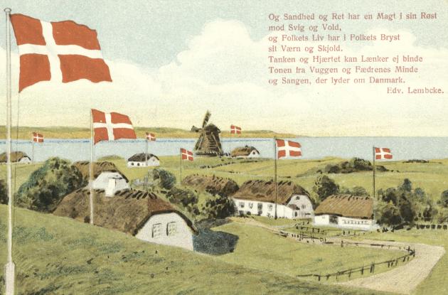 Dannebrog waves over a fjord landscape in southern Jutland