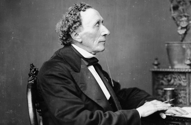 Hans Christian Andersen at his desk