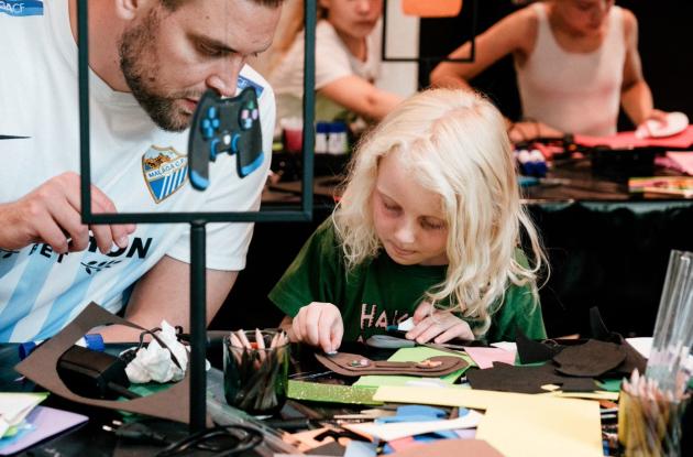 Father and daughter at workshop