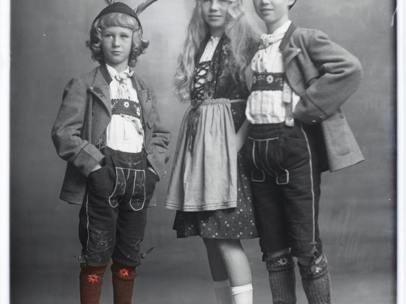 Three children in costume